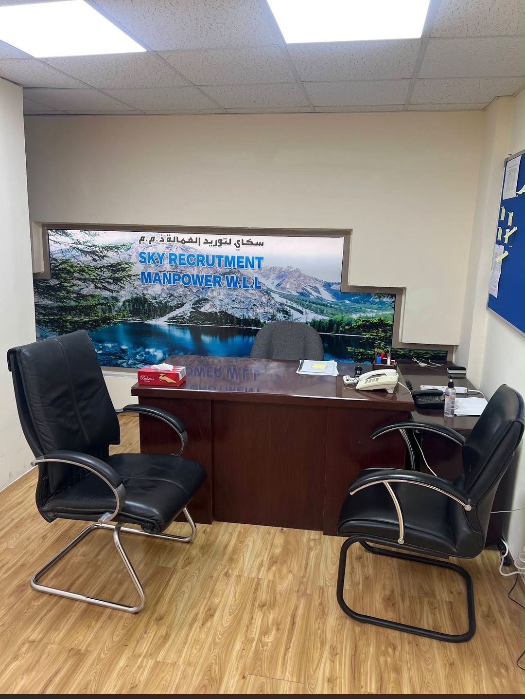 Inside the Sky Employment Office in Manama, with the reception desk and client meeting area